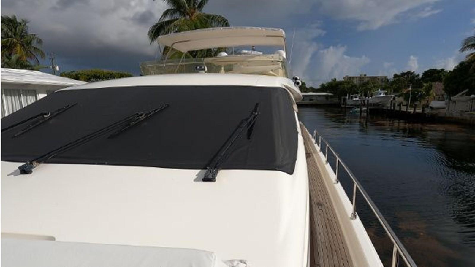 a boat on a body of water aboard 2005 760 FERRETTI MOTOR YACHT Yacht for Sale