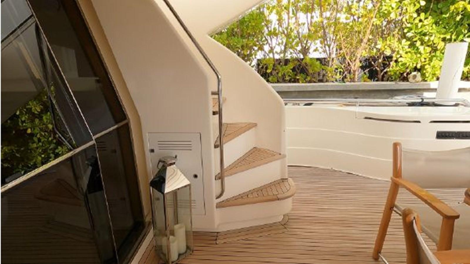 a white box on a wooden floor aboard 2005 760 FERRETTI MOTOR YACHT Yacht for Sale