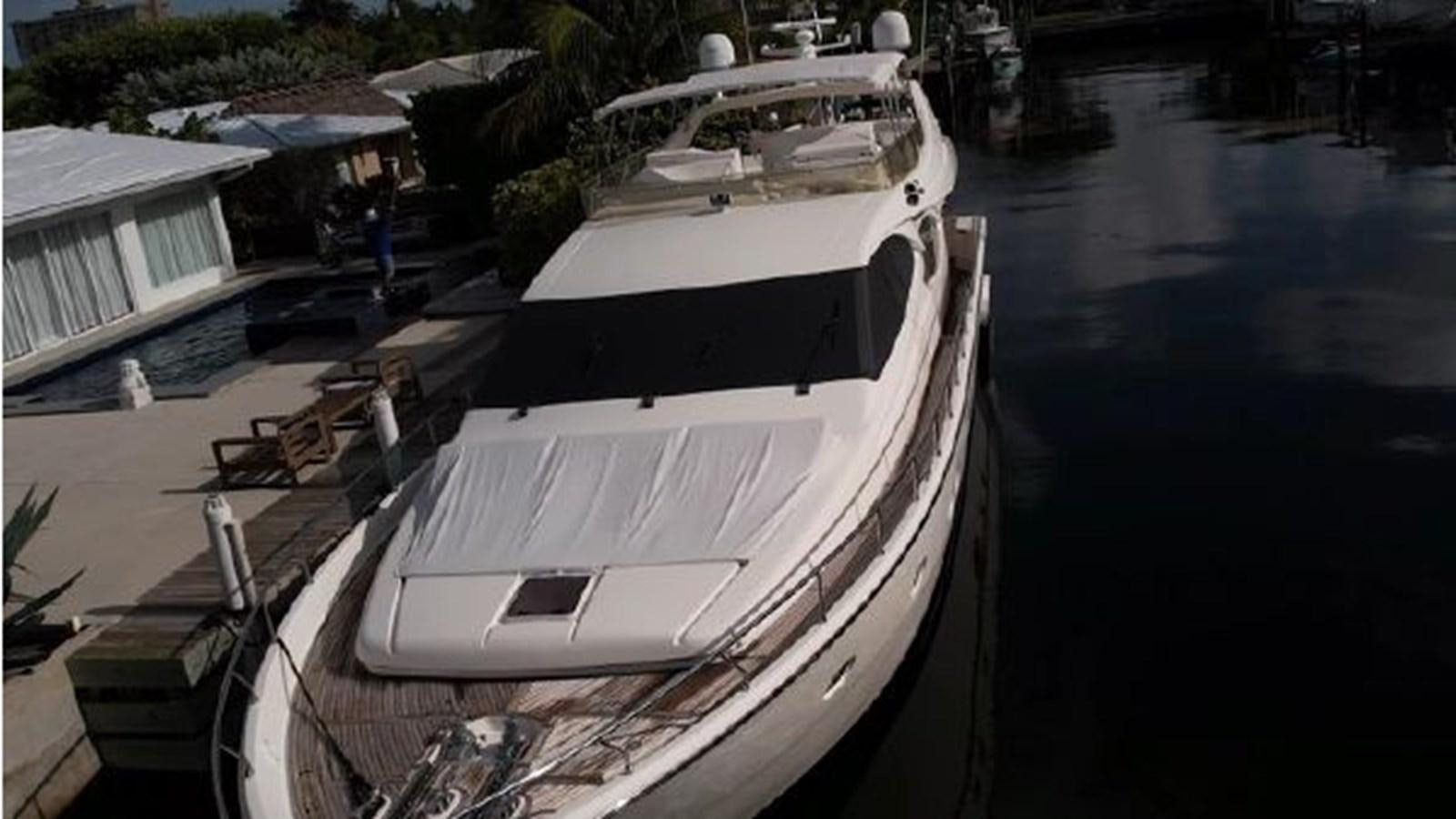 a boat docked at a pier aboard 2005 760 FERRETTI MOTOR YACHT Yacht for Sale