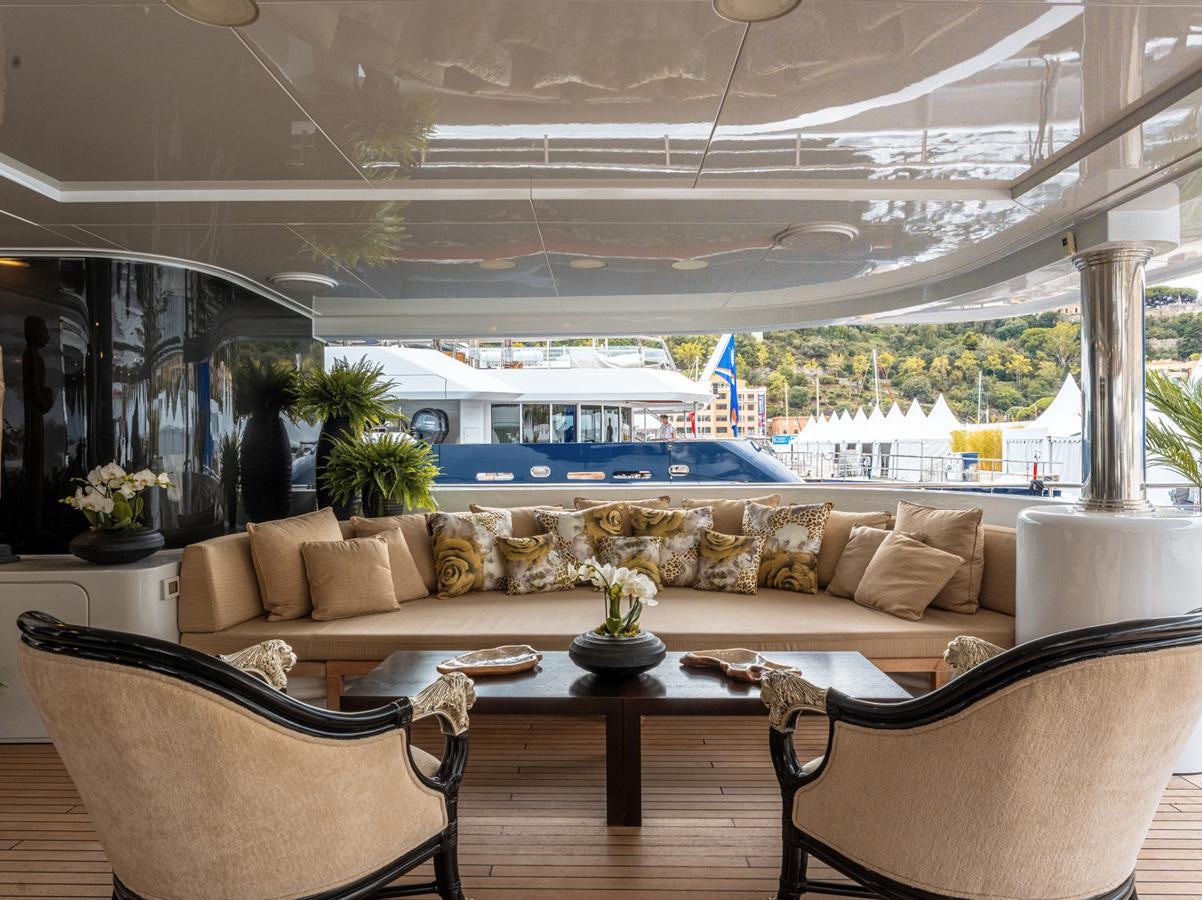 a living room with a large window aboard MONEIKOS Yacht for Sale