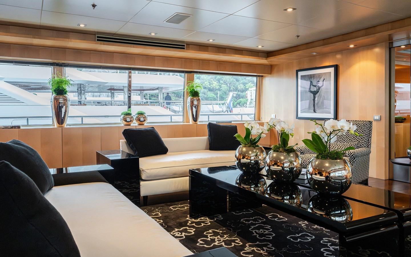 a living room with a large window aboard MONEIKOS Yacht for Sale