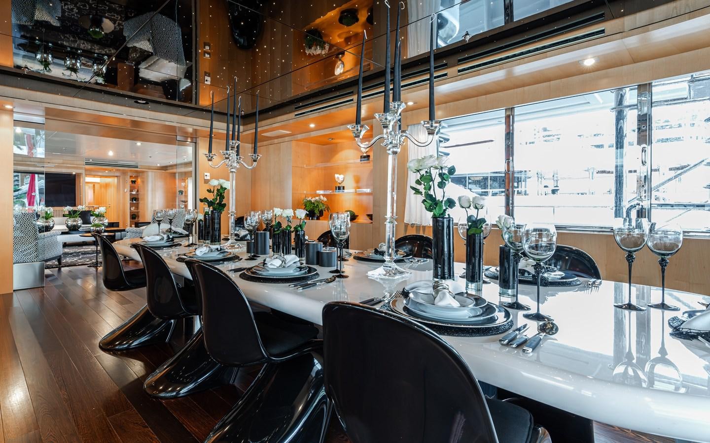 a large dining room table aboard MONEIKOS Yacht for Sale