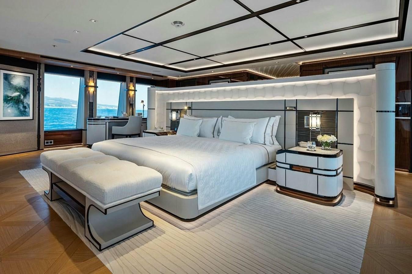 a large living room with a large bed aboard LUSINE Yacht for Sale