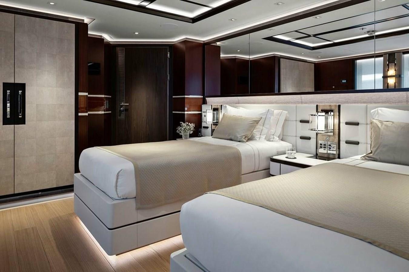 a room with two beds aboard LUSINE Yacht for Sale