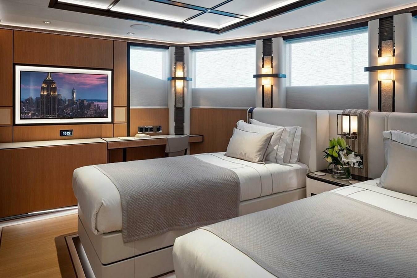 a room with two beds aboard LUSINE Yacht for Sale