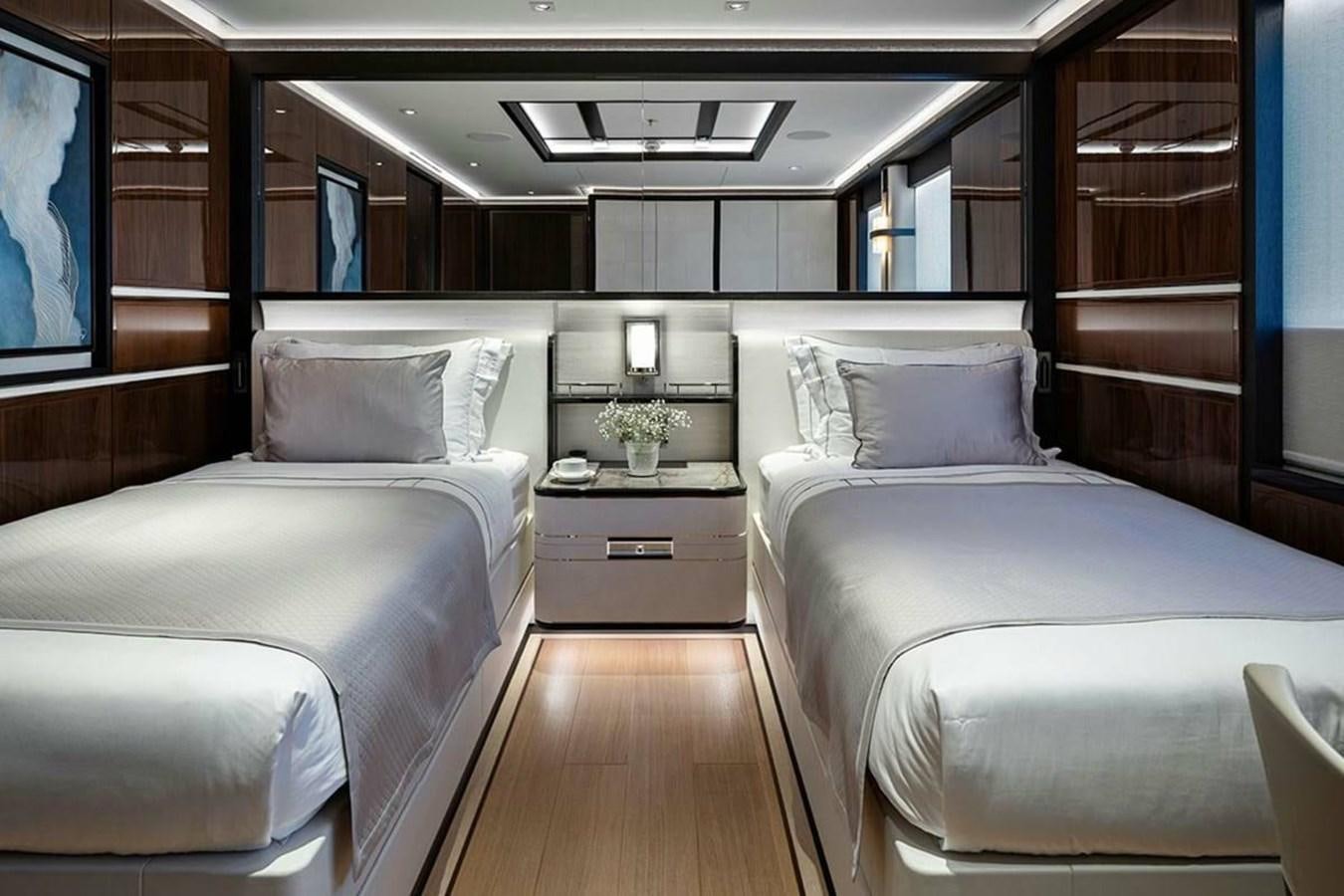 a room with two beds aboard LUSINE Yacht for Sale