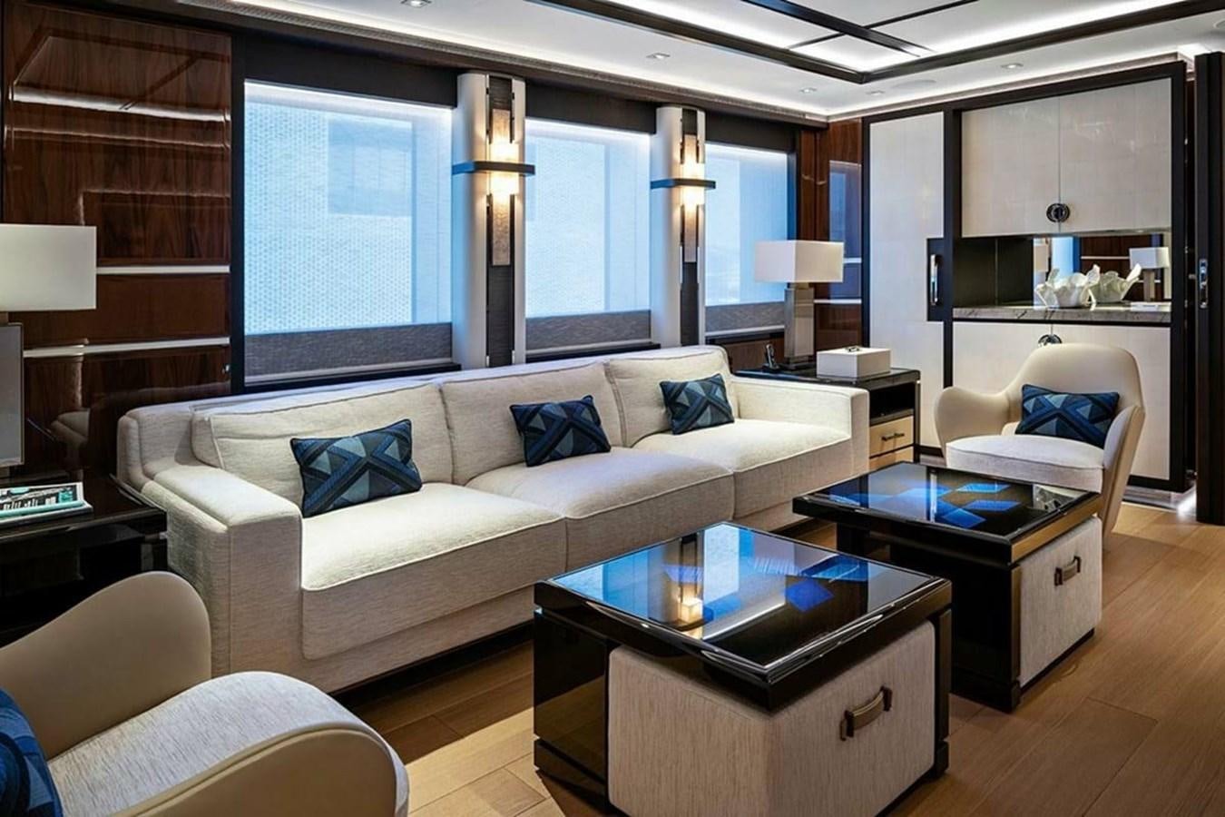 a living room with a large window aboard LUSINE Yacht for Sale