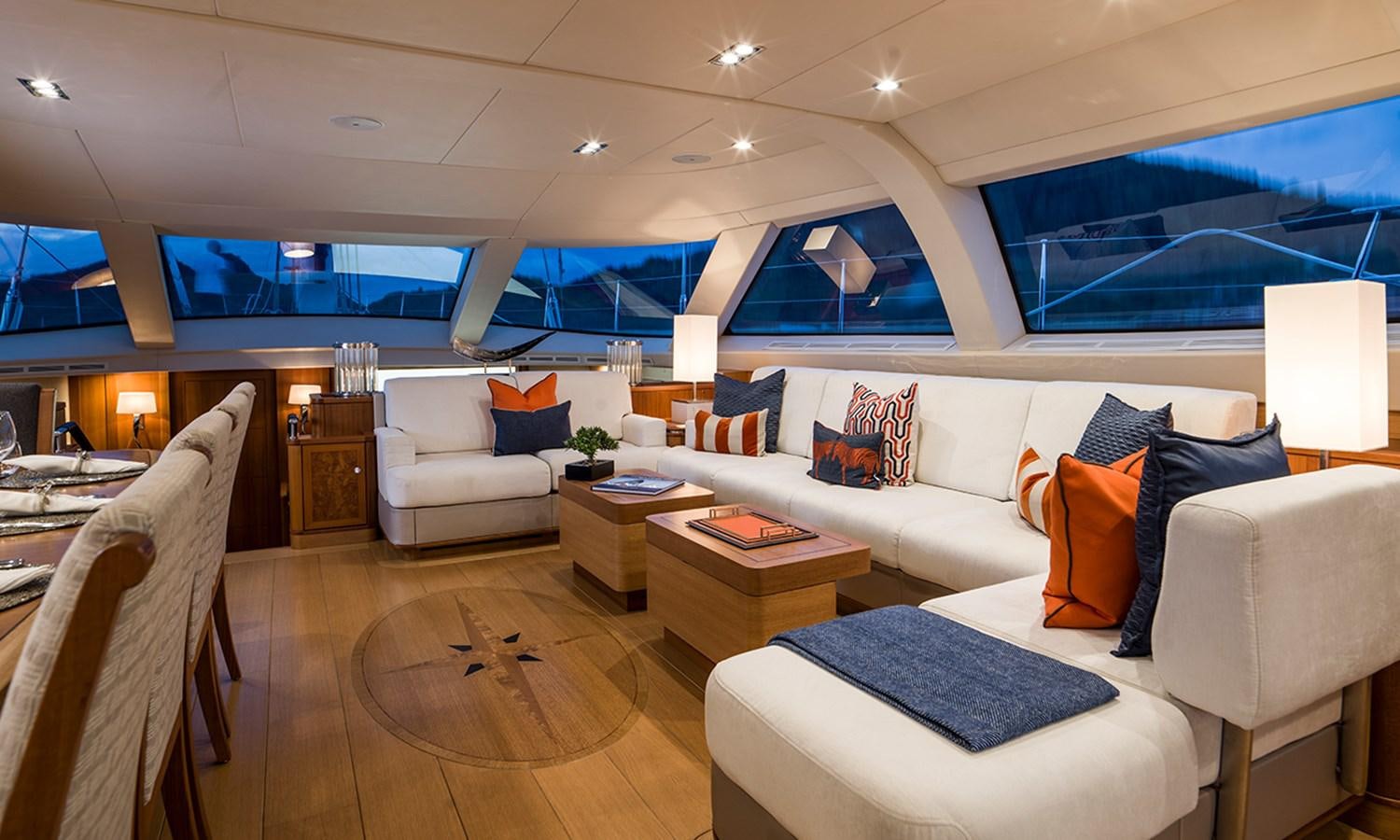 a living room with a couch and a table aboard TWILIGHT Yacht for Sale