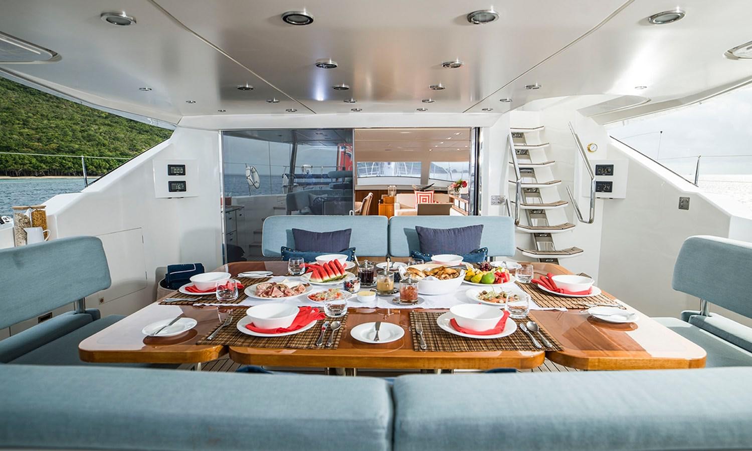 a dining table on a boat aboard TWILIGHT Yacht for Sale