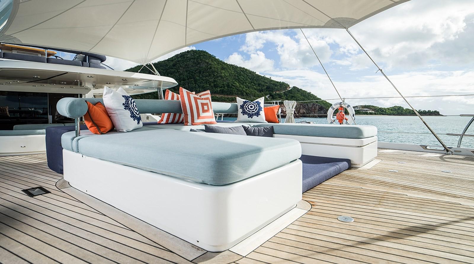 a boat on a deck aboard TWILIGHT Yacht for Sale