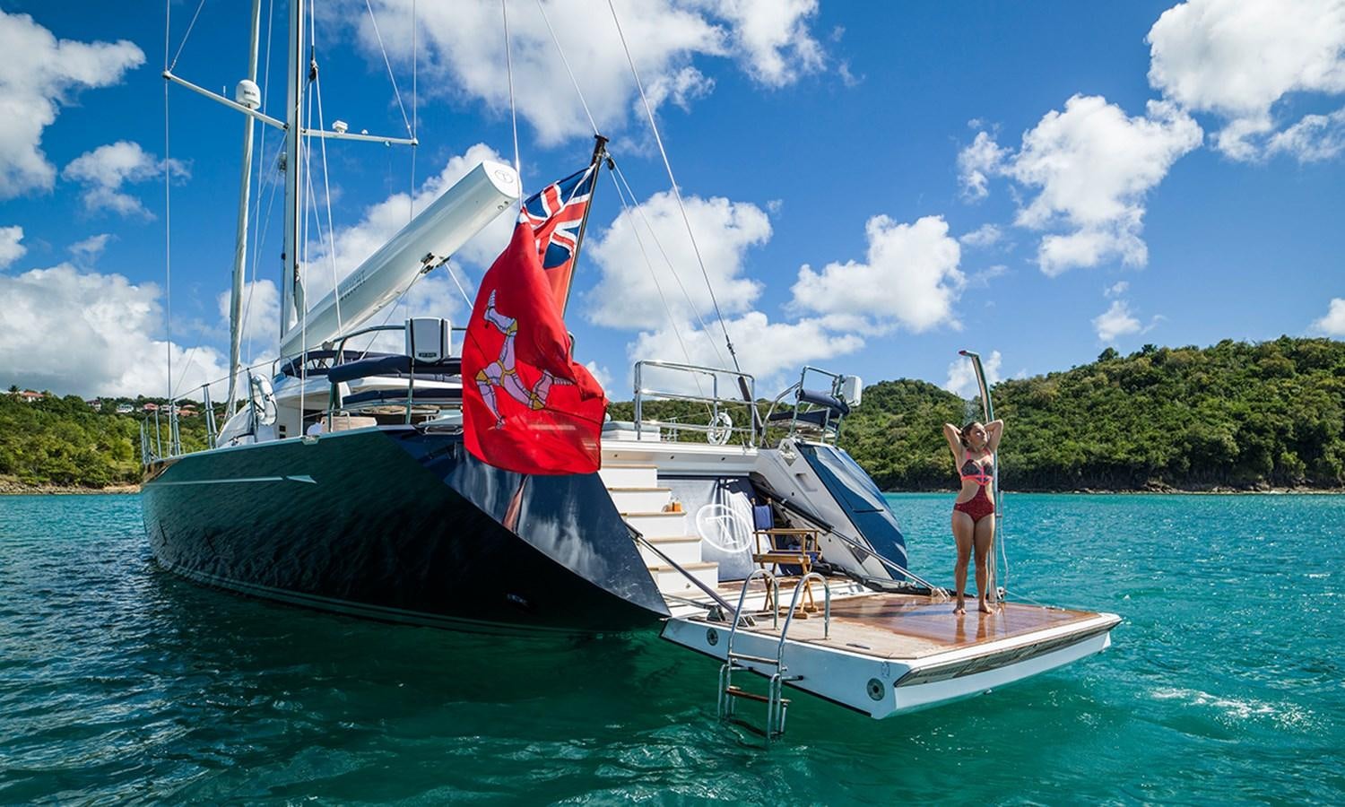 a person standing on a boat aboard TWILIGHT Yacht for Sale