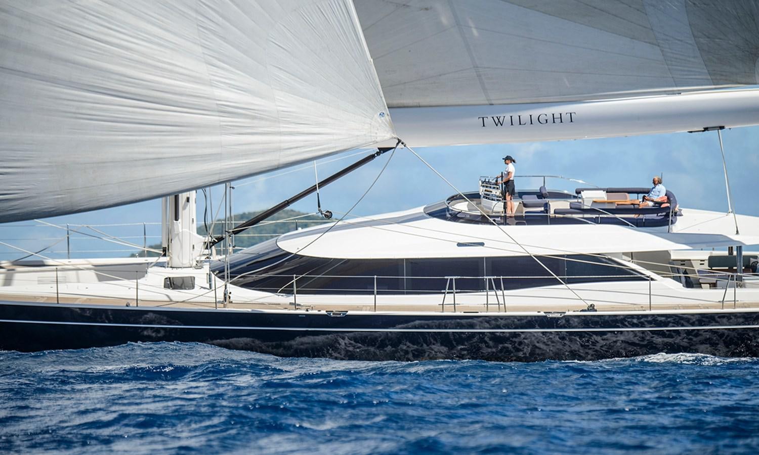 a couple of people on a boat aboard TWILIGHT Yacht for Sale