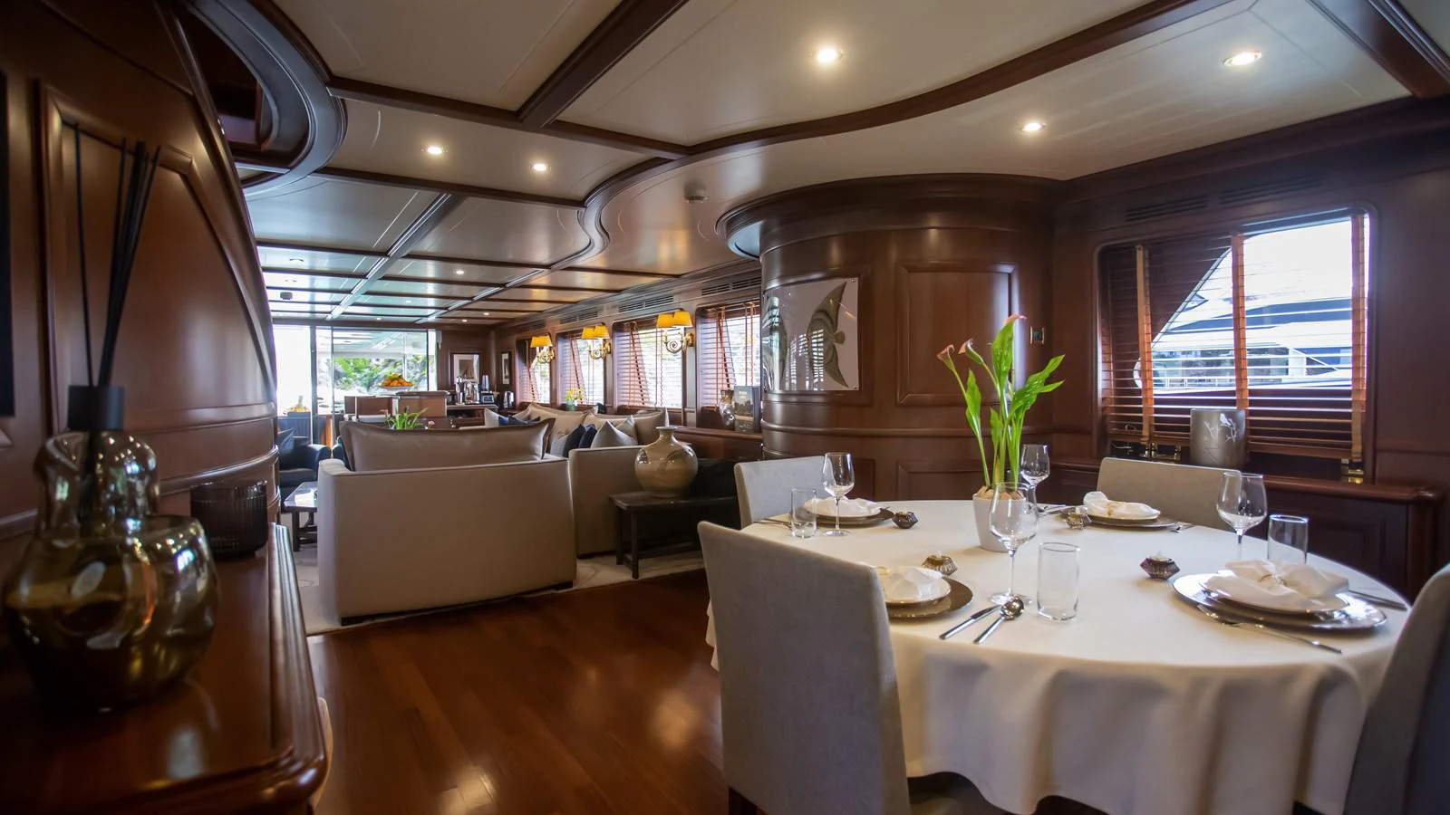 a large dining room with a large table and chairs aboard HAG Yacht for Sale