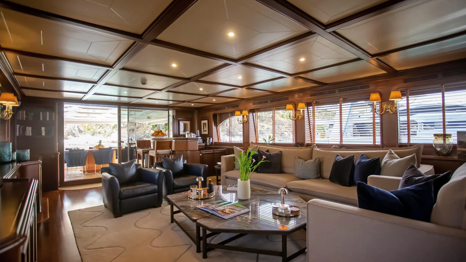 a living room with a large window aboard HAG Yacht for Sale