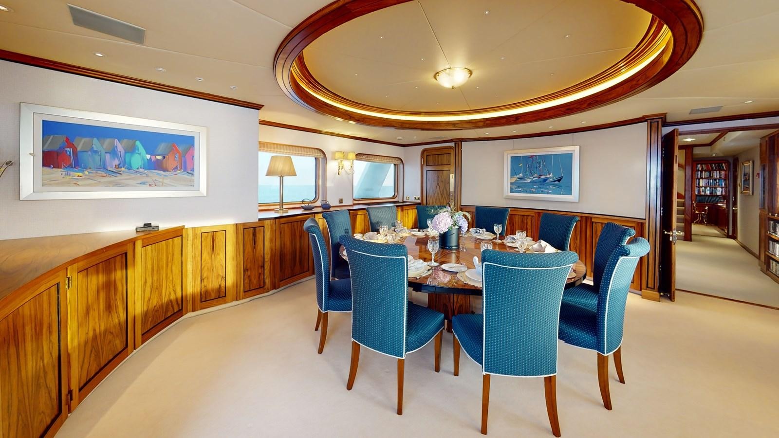 a room with a table and chairs aboard WILAMINA Yacht for Sale