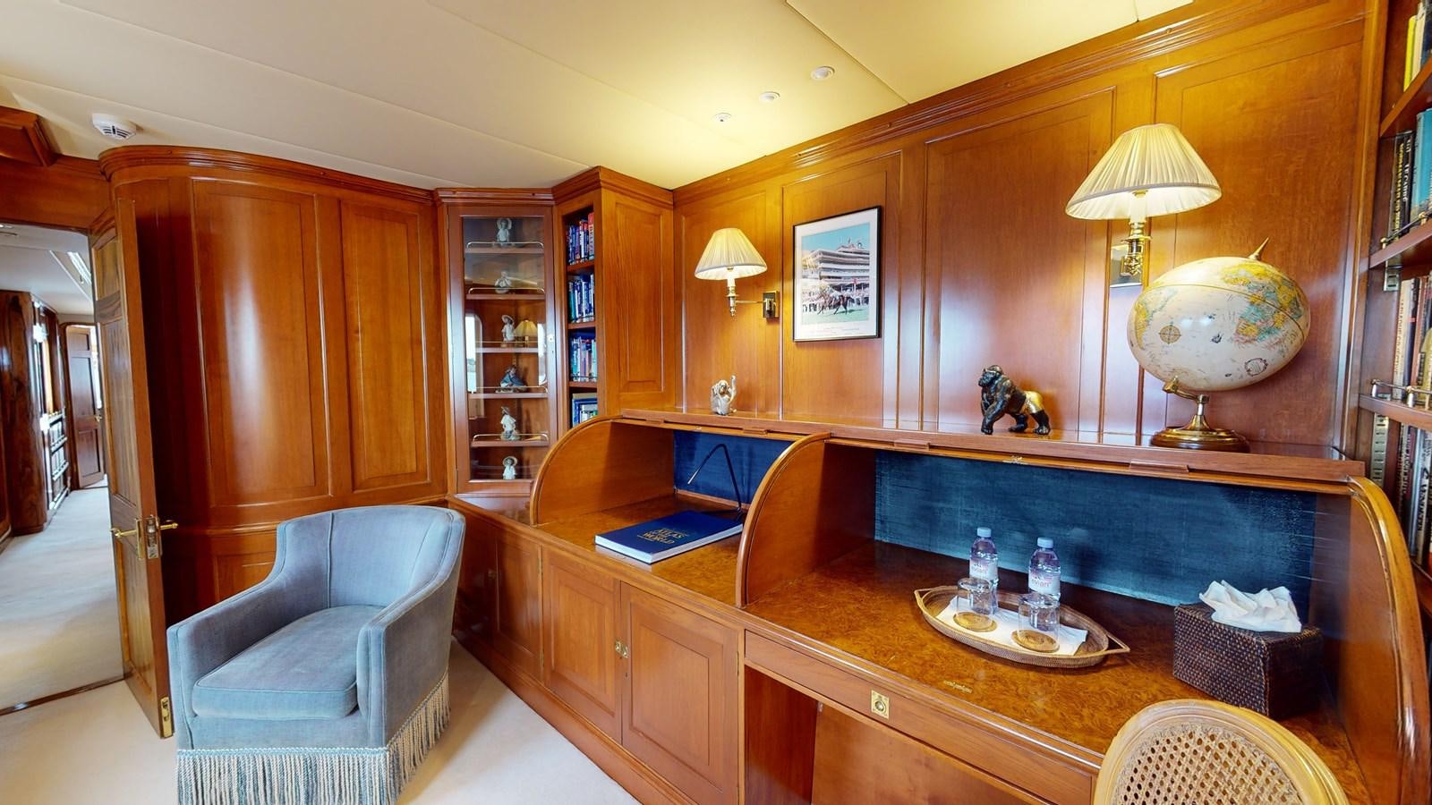 a room with a desk and a chair aboard WILAMINA Yacht for Sale