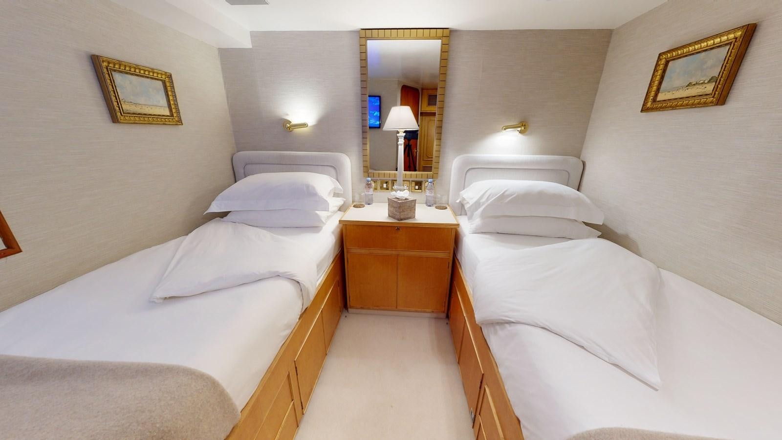 a room with two beds aboard WILAMINA Yacht for Sale