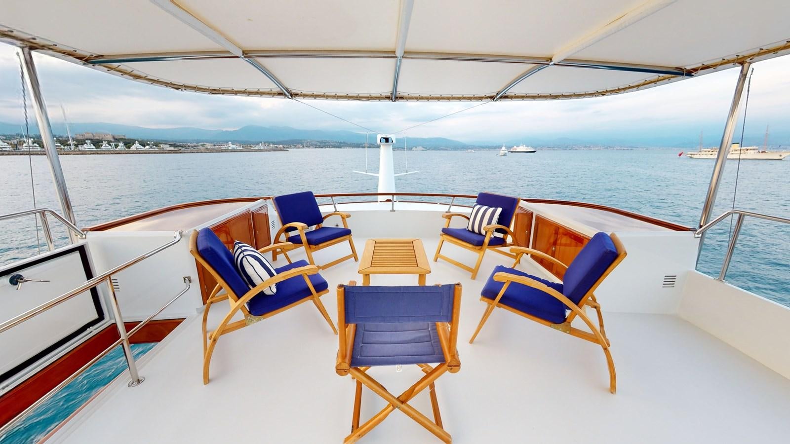 a group of chairs on a boat aboard WILAMINA Yacht for Sale
