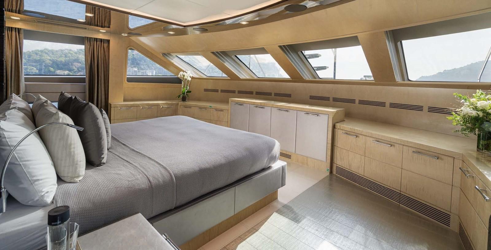 a room with a couch and a table aboard EDESIA Yacht for Charter