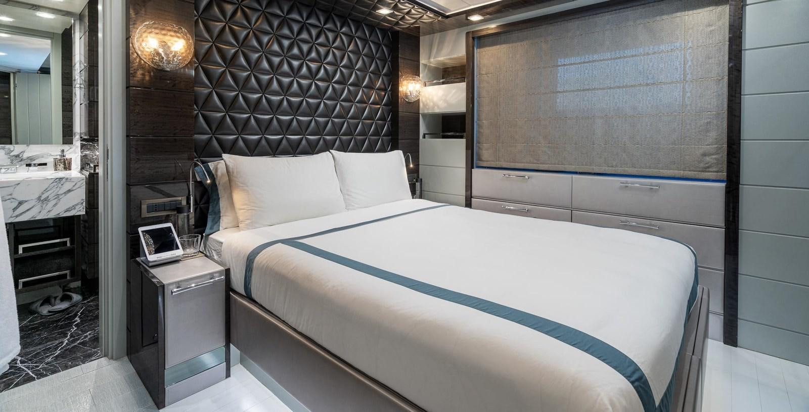 a bed in a room aboard EDESIA Yacht for Charter