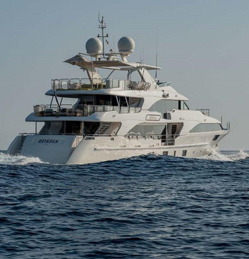 a large white ship in the water aboard EDESIA Yacht for Charter