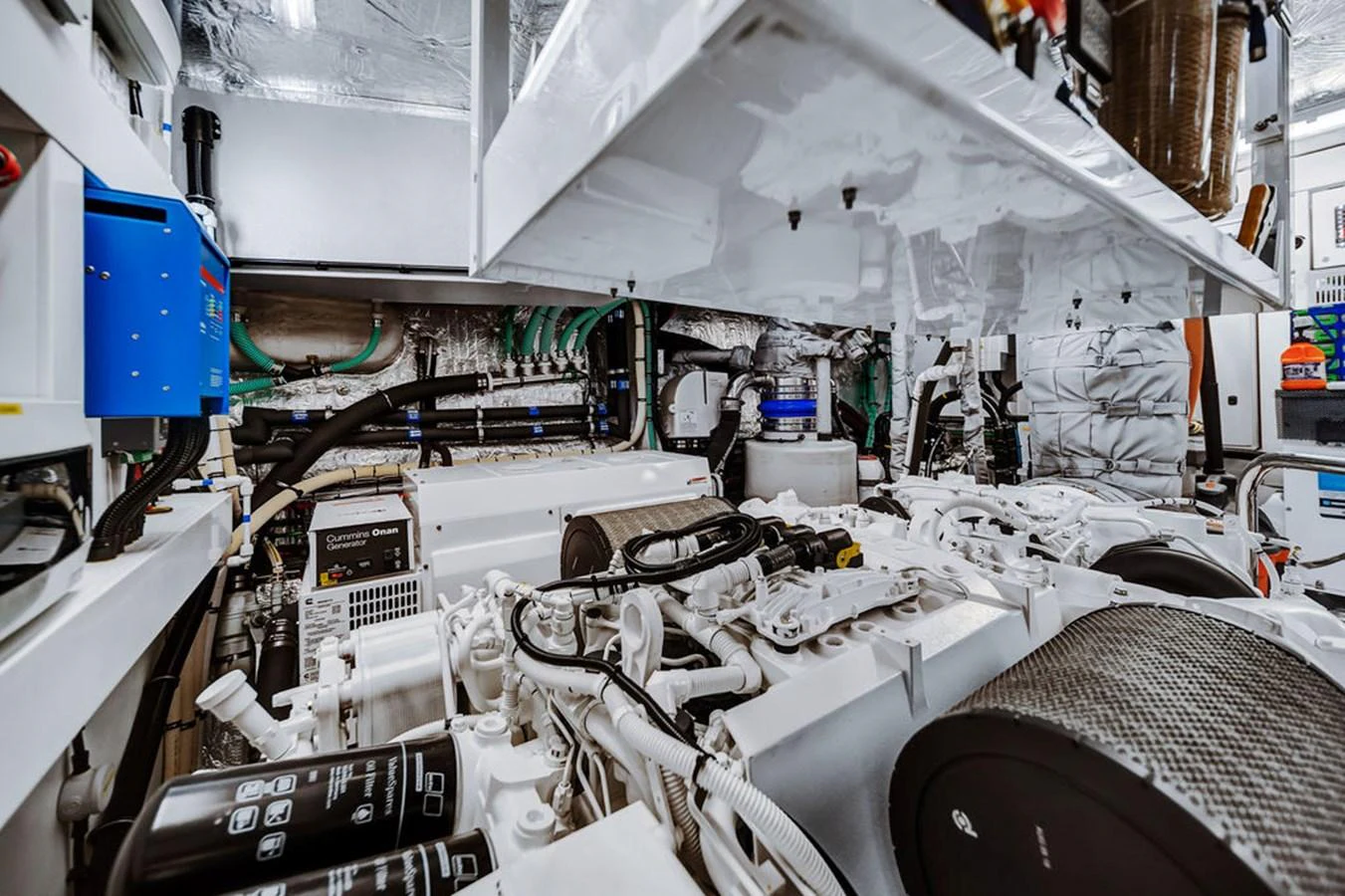 The image showcases the yacht's pristine engine room with advanced machinery and equipment. aboard SUNSEEKER Yacht for Sale
