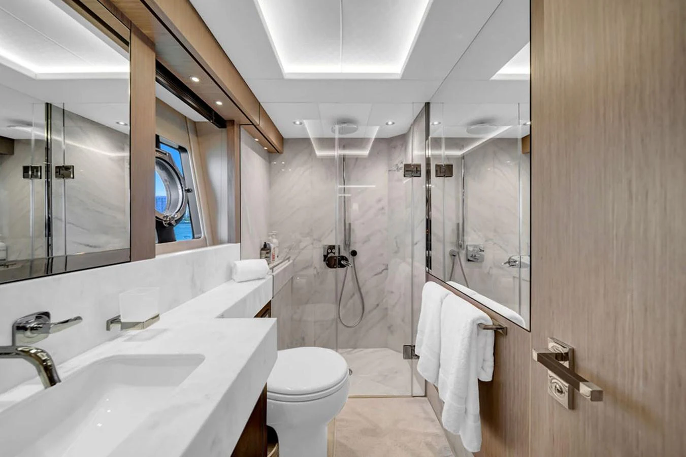 The yacht's bathroom features a sleek design with modern fixtures and a spacious shower area. aboard SUNSEEKER Yacht for Sale