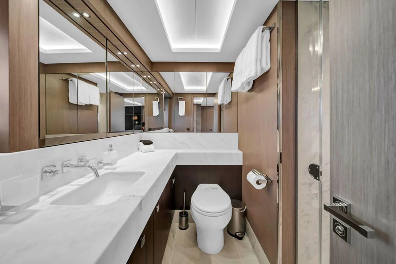 The yacht's bathroom features modern fixtures and a sleek, minimalist design. aboard SUNSEEKER Yacht for Sale