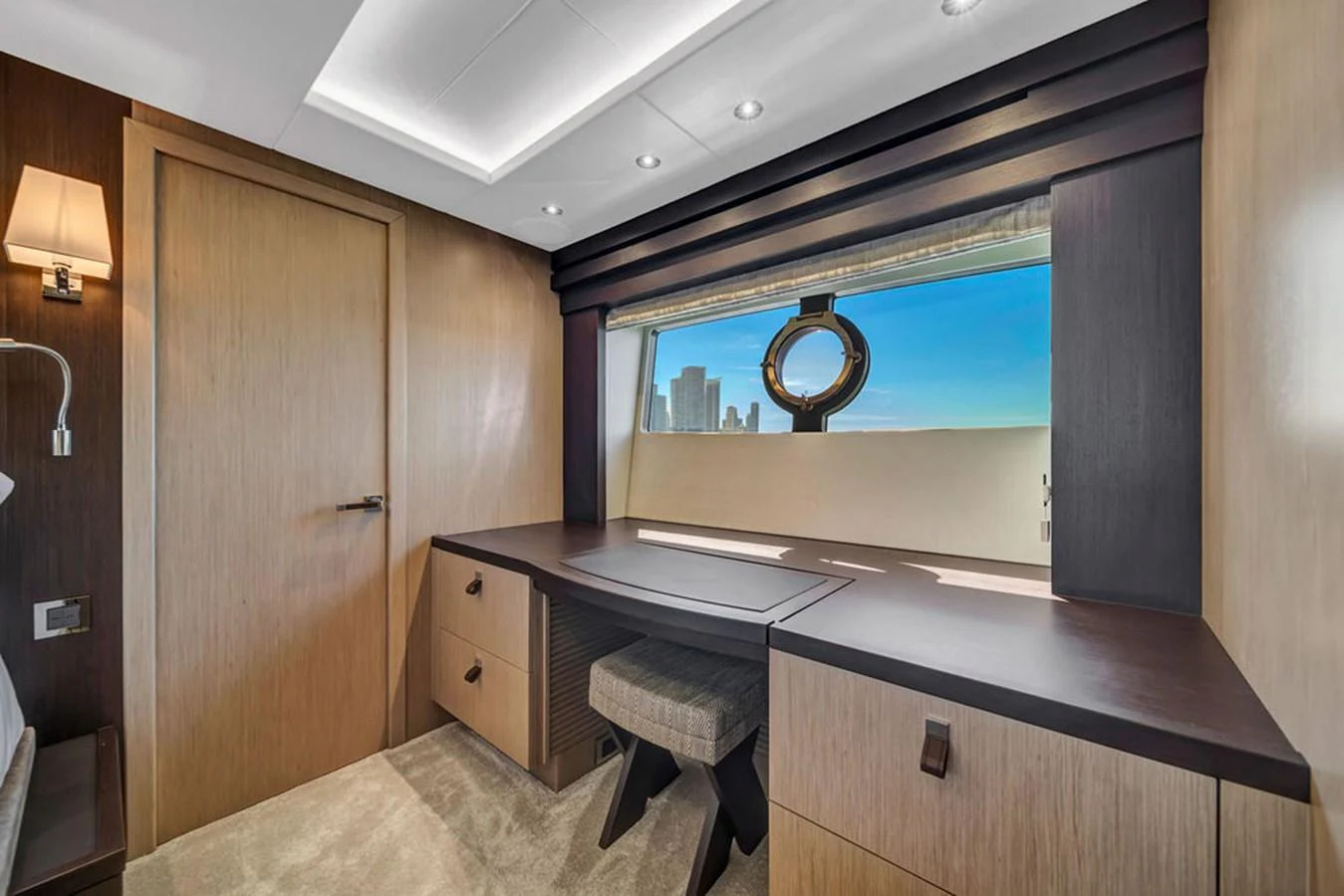 A luxurious stateroom with a desk, offering a serene workspace with a view of the sea. aboard SUNSEEKER Yacht for Sale