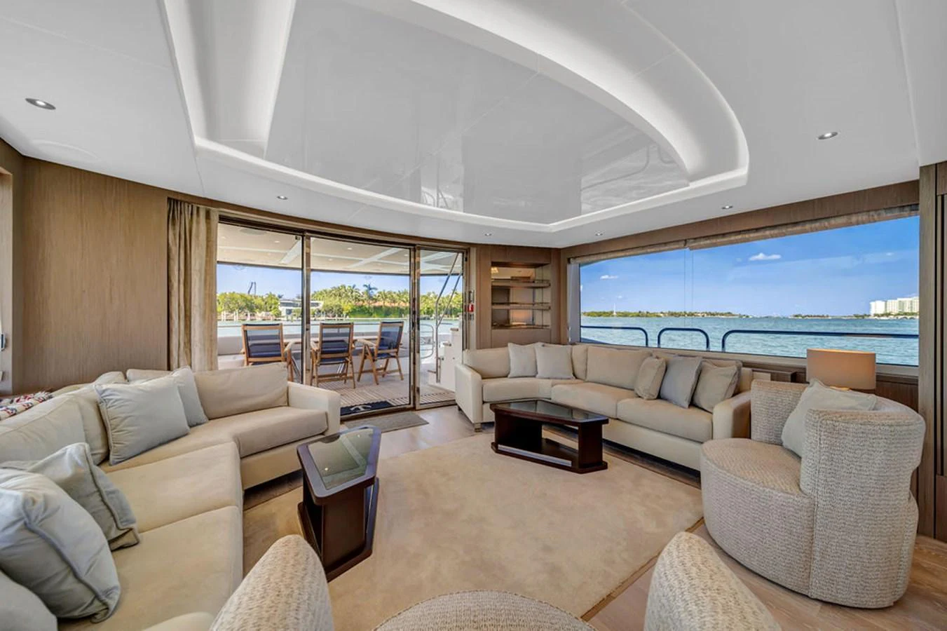 The salon offers a spacious and luxurious seating area with panoramic views of the water. aboard SUNSEEKER Yacht for Sale