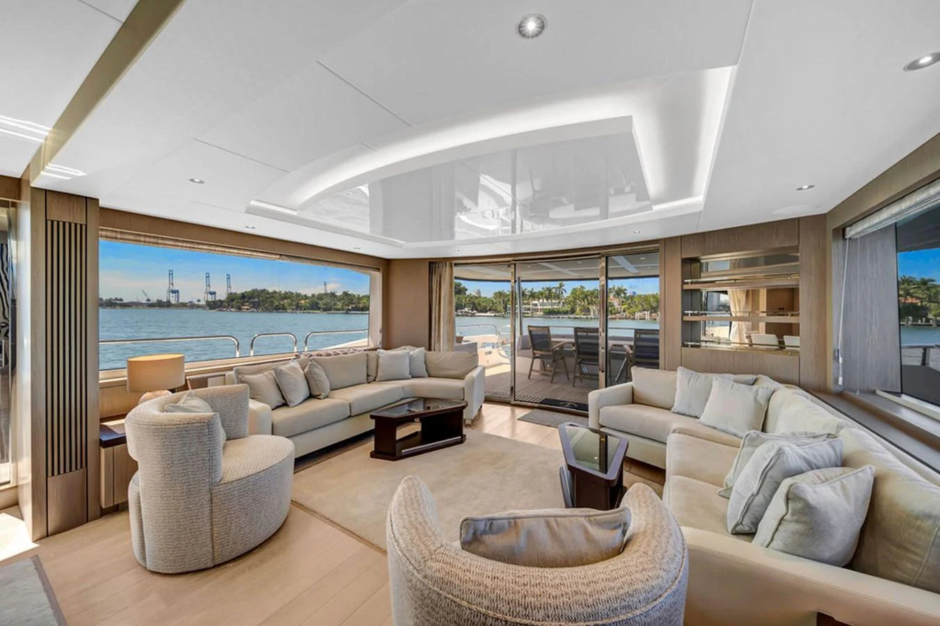 The salon offers a spacious and luxurious seating area with panoramic views of the water. aboard SUNSEEKER Yacht for Sale