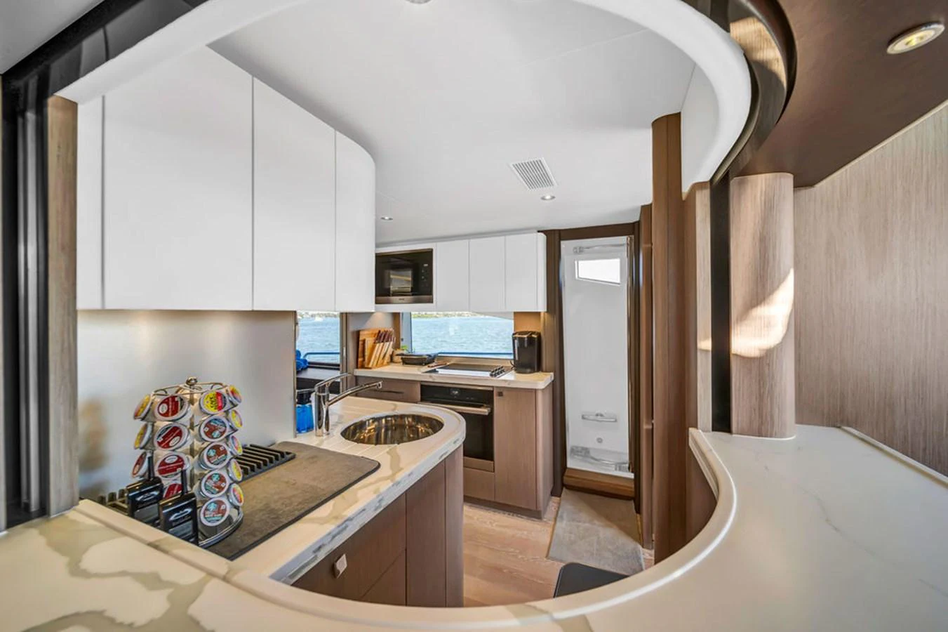 The yacht's galley features modern appliances and a sleek design, perfect for gourmet cooking at sea. aboard SUNSEEKER Yacht for Sale