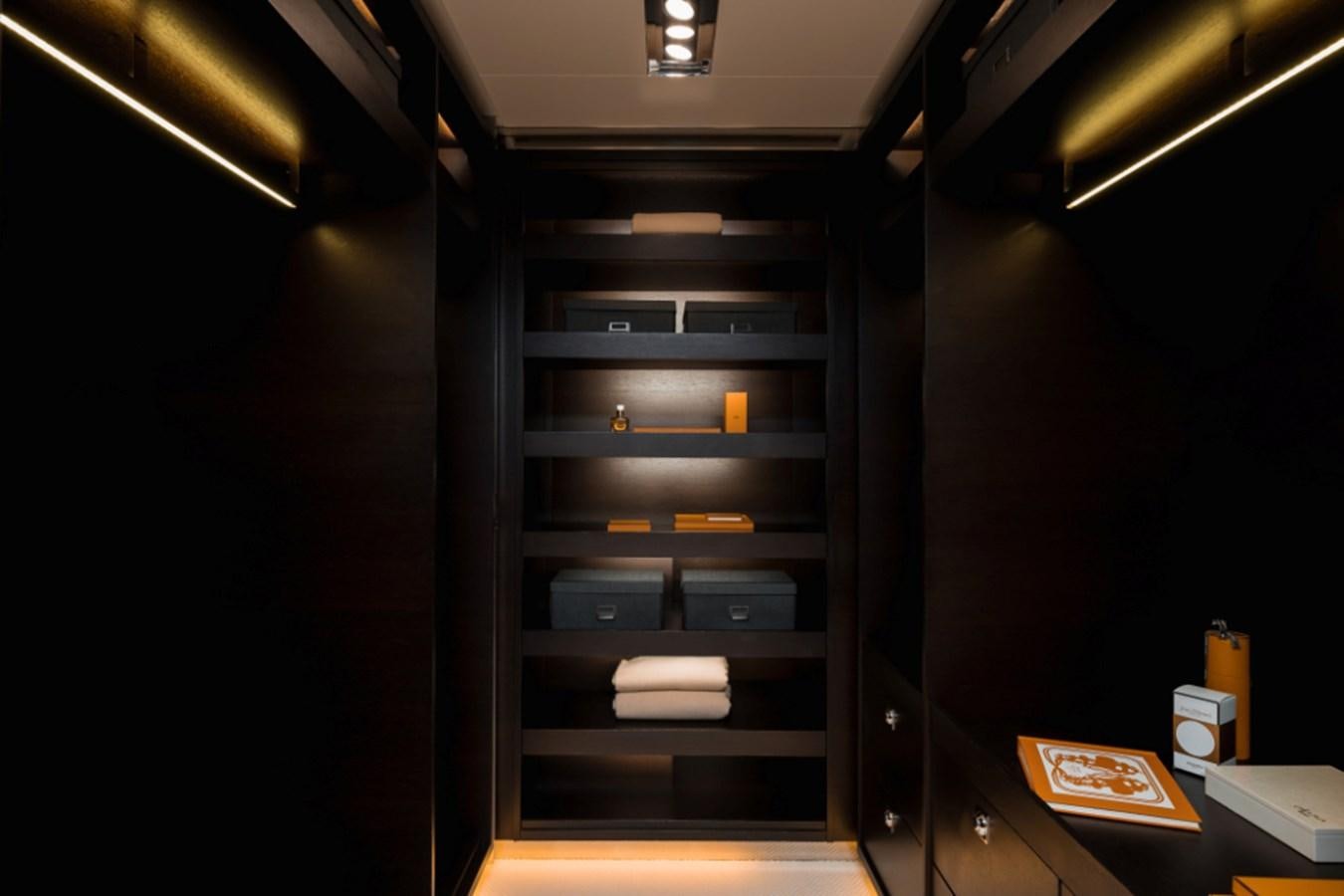 a black cabinet with a white box and a red box on it aboard LOON Yacht for Sale