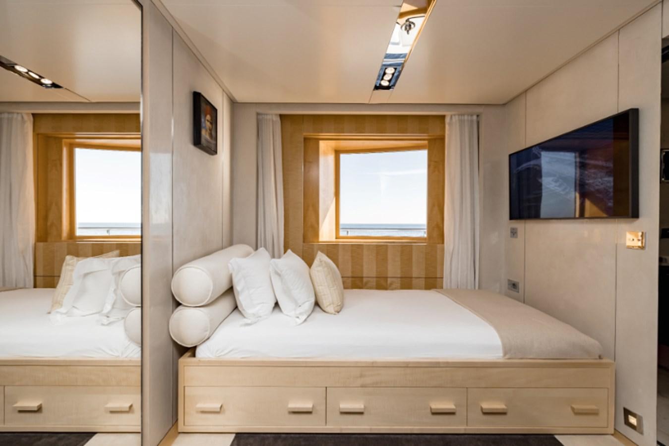 a room with two beds aboard LOON Yacht for Sale