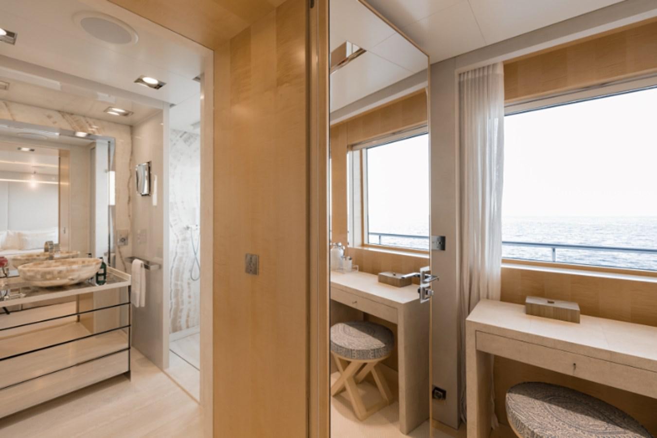 a bathroom with a sink and a mirror aboard LOON Yacht for Sale