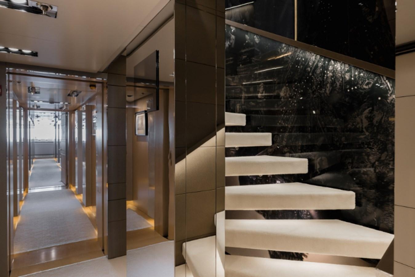 a room with a wall of mirrors aboard LOON Yacht for Sale