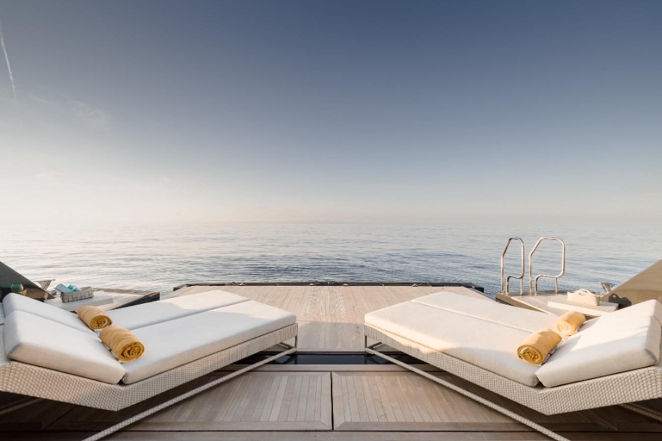 a couple of boats sit on a dock aboard LOON Yacht for Sale