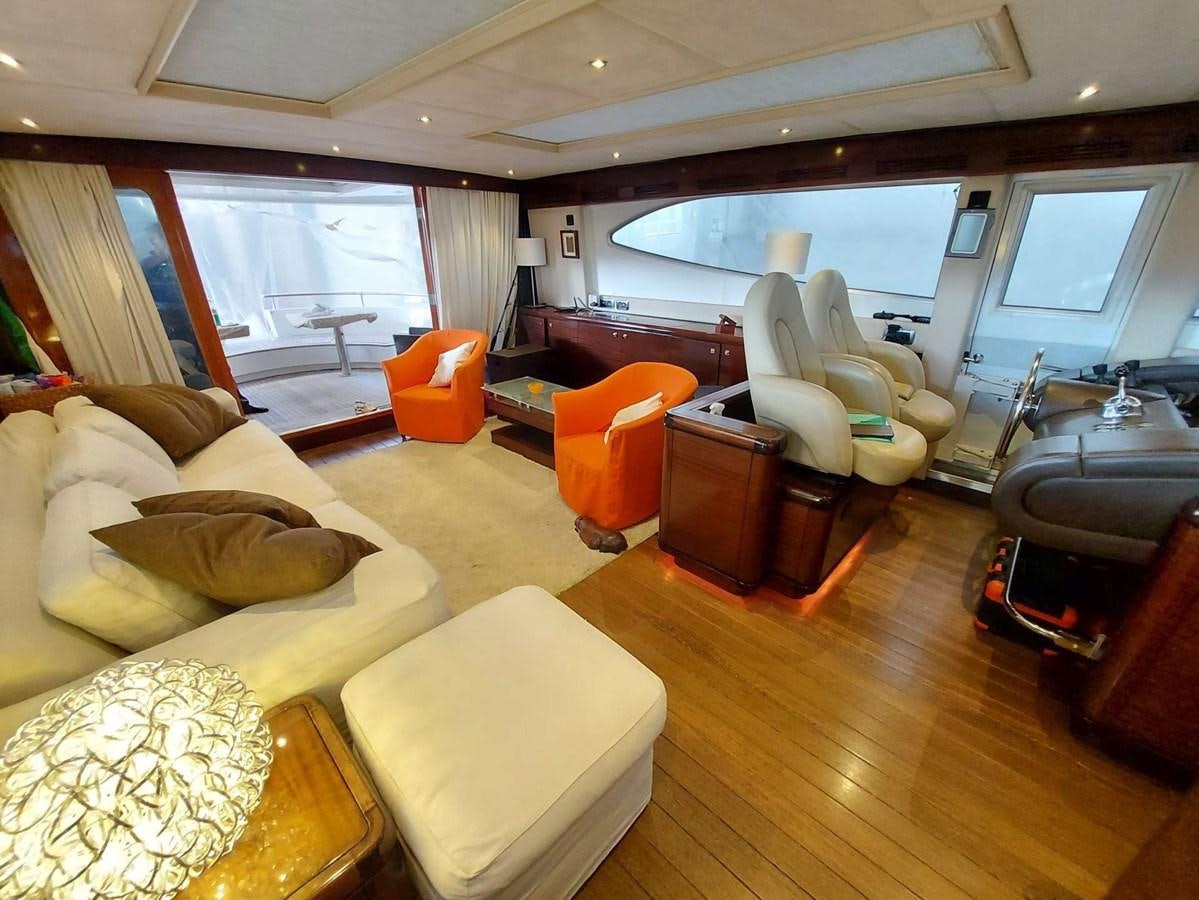 a living room with a large window aboard LADY ROSE Yacht for Sale