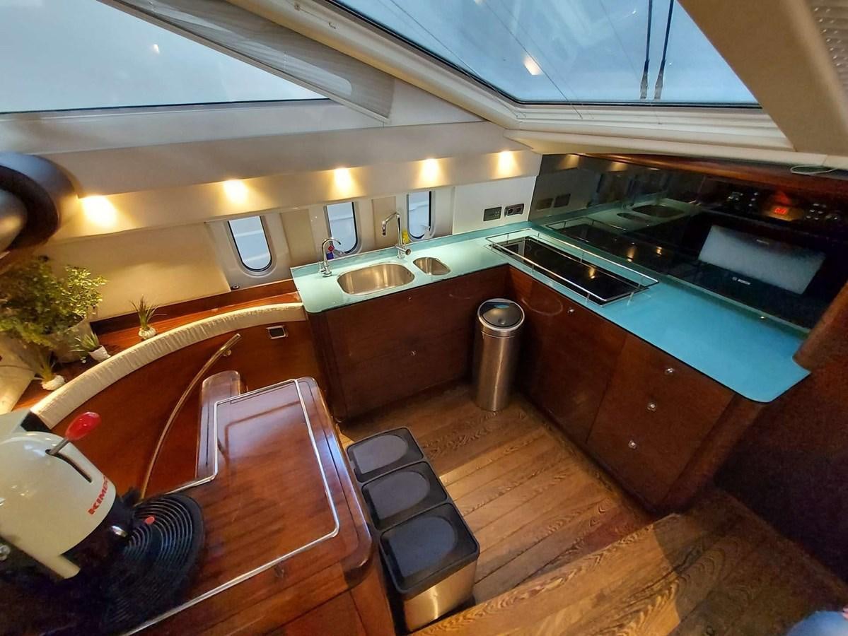a kitchen with a large island aboard LADY ROSE Yacht for Sale