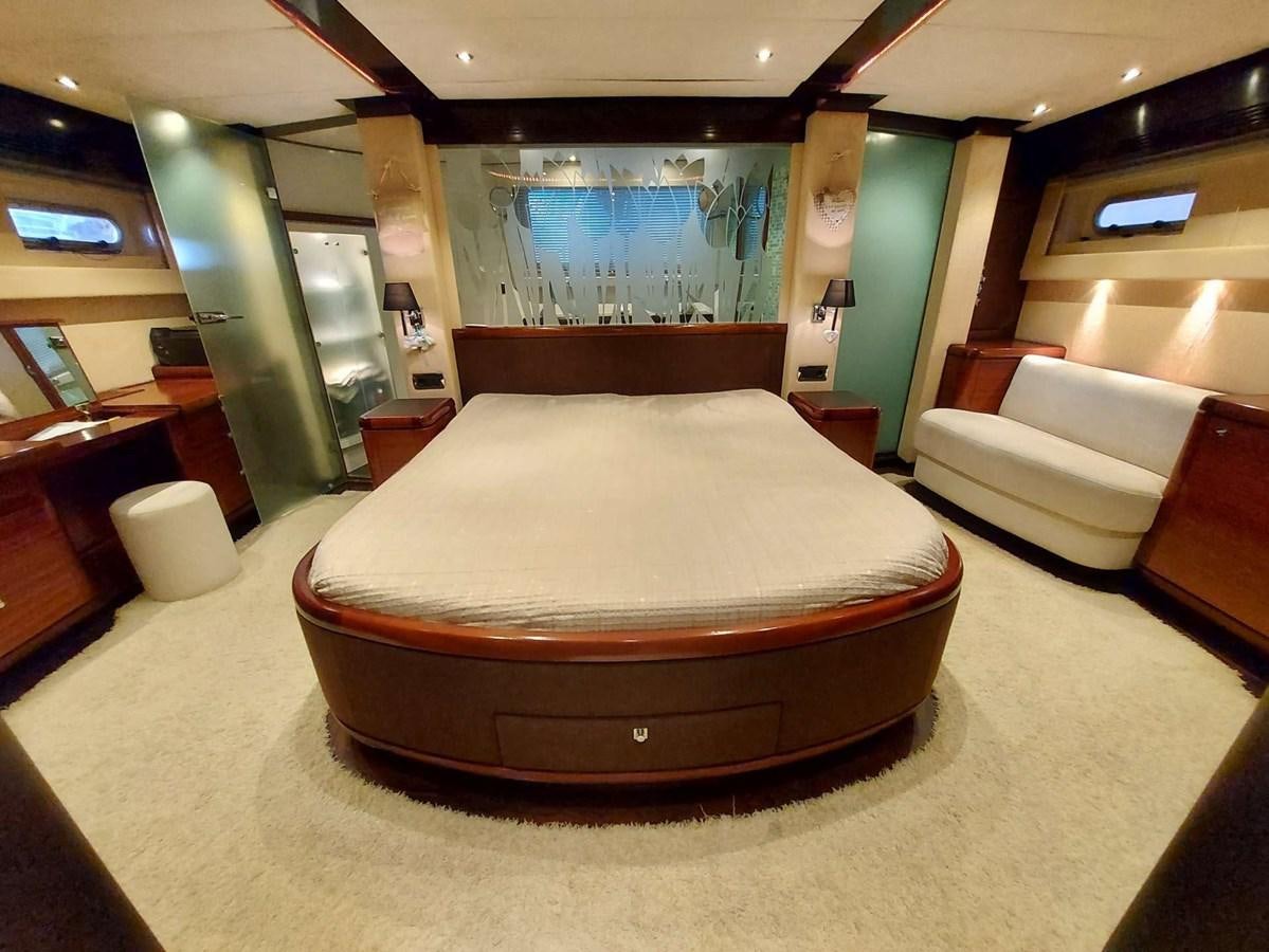 a large bed in a room aboard LADY ROSE Yacht for Sale