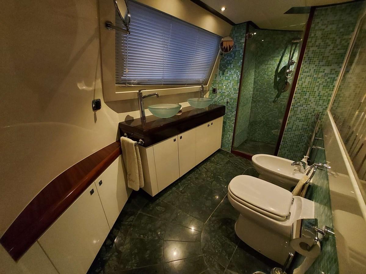a bathroom with a sink toilet and a bathtub aboard LADY ROSE Yacht for Sale