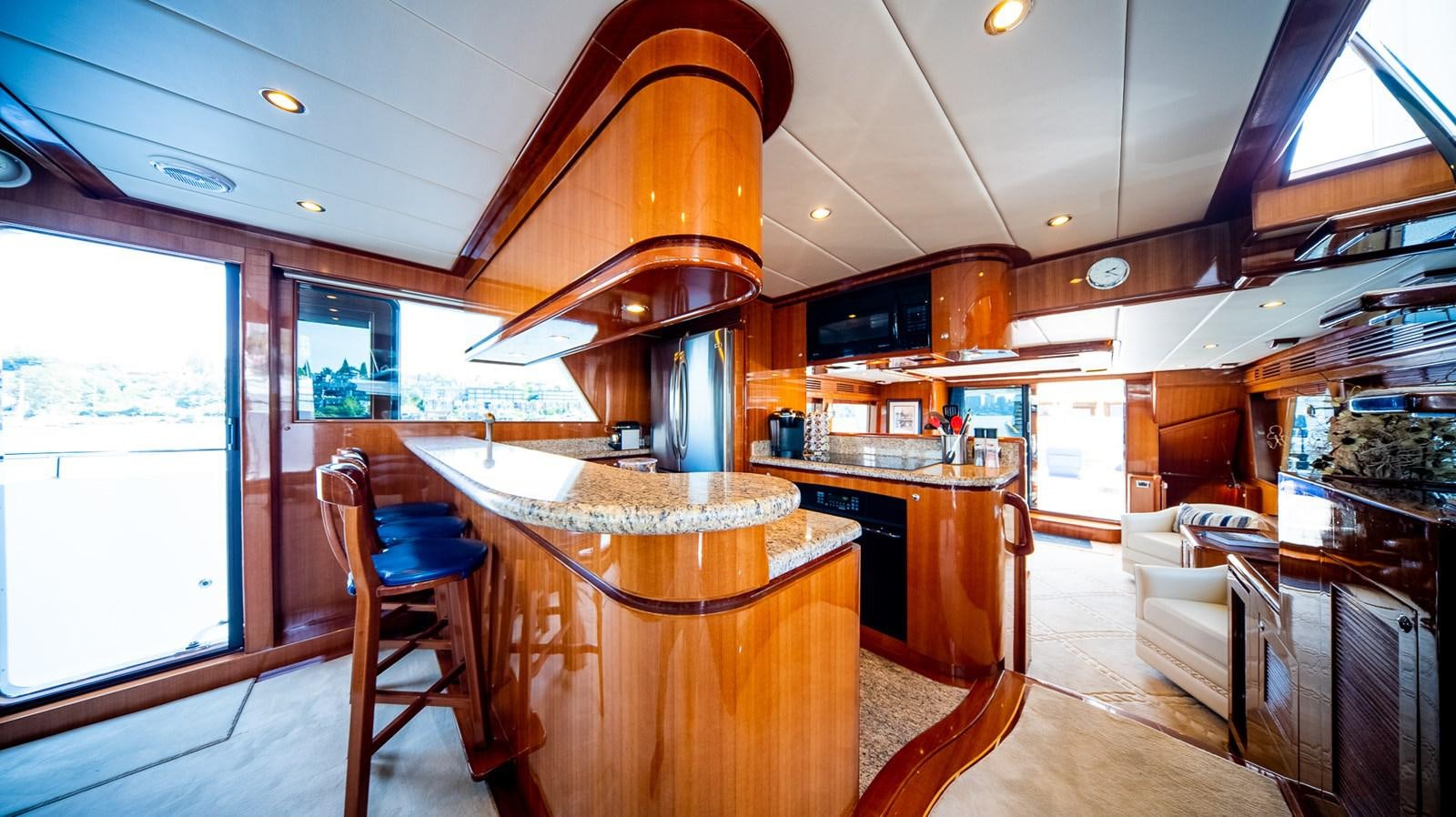 a kitchen with a table and chairs aboard SEA CZAR Yacht for Sale