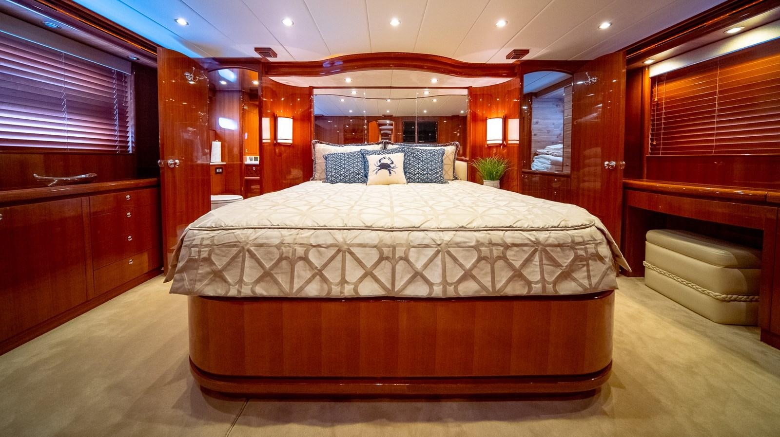a bed in a room aboard SEA CZAR Yacht for Sale
