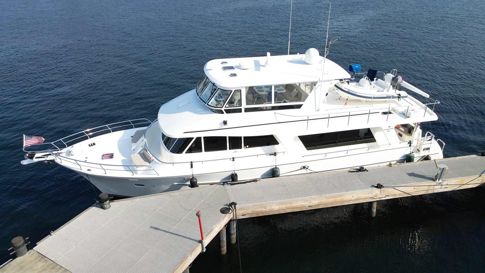 a white yacht on the water aboard SEA CZAR Yacht for Sale