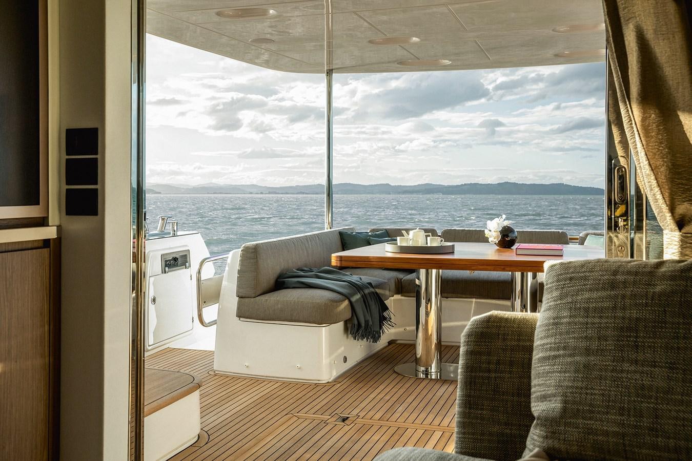 a room with a table and chairs aboard 66 MAGELLANO Yacht for Sale