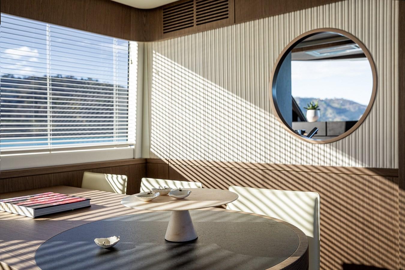 a room with a round mirror aboard 66 MAGELLANO Yacht for Sale