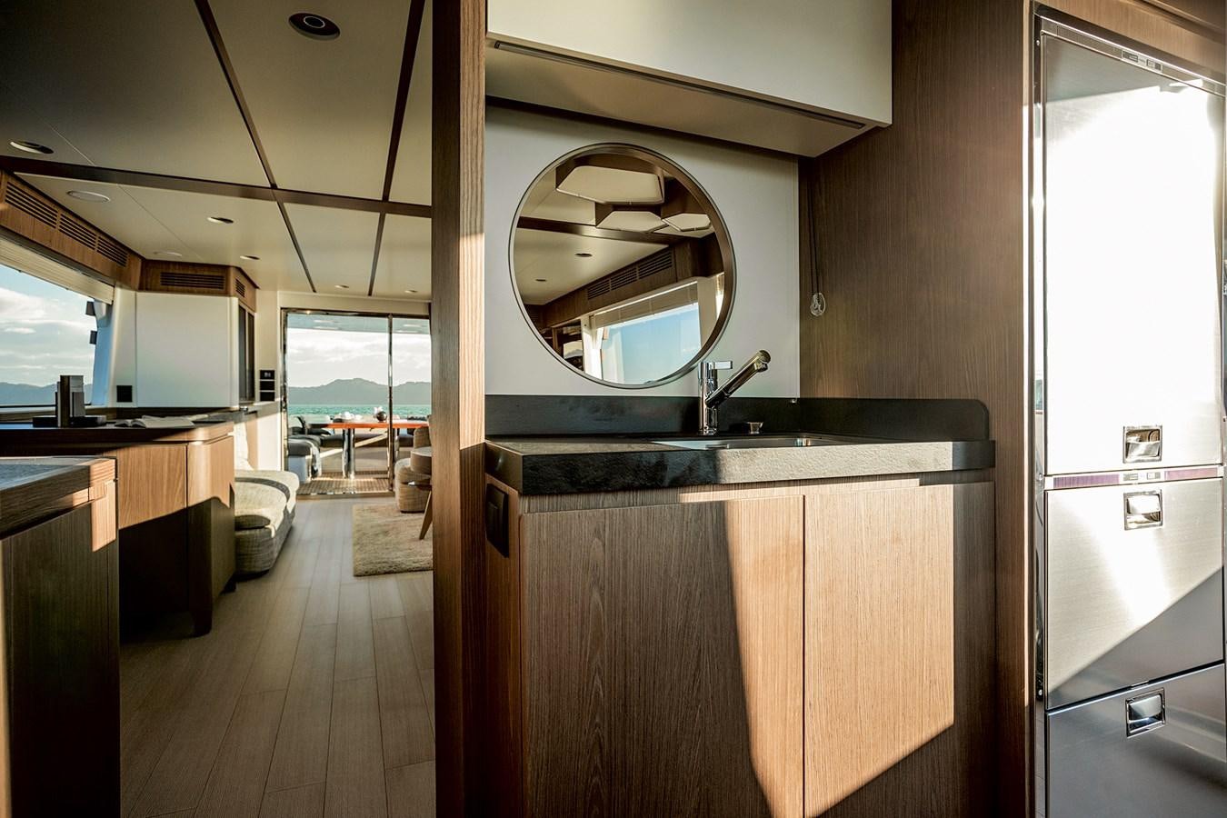 a kitchen with a large mirror aboard 66 MAGELLANO Yacht for Sale
