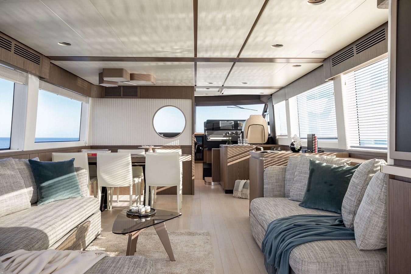 a living room with a couch and a table aboard 66 MAGELLANO Yacht for Sale