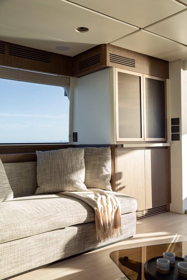 a couch in a room aboard 66 MAGELLANO Yacht for Sale