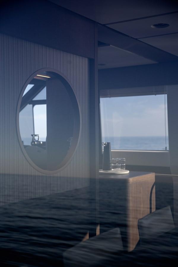 a room with a large mirror aboard 66 MAGELLANO Yacht for Sale